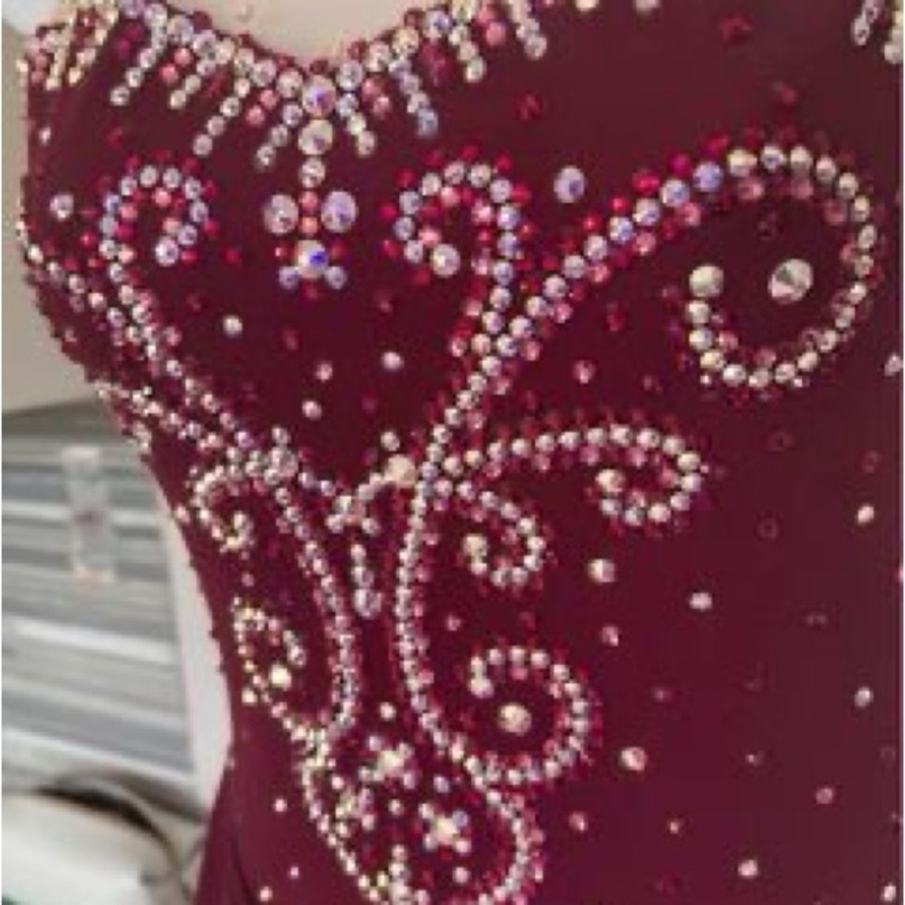 Stunning wine ice dancing dress. Size women small.